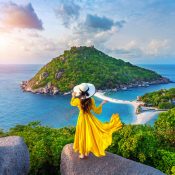 Beautiful girl standing on viewpoint at Koh Nangyuan island near Koh Tao island, Surat Thani in Thailand.